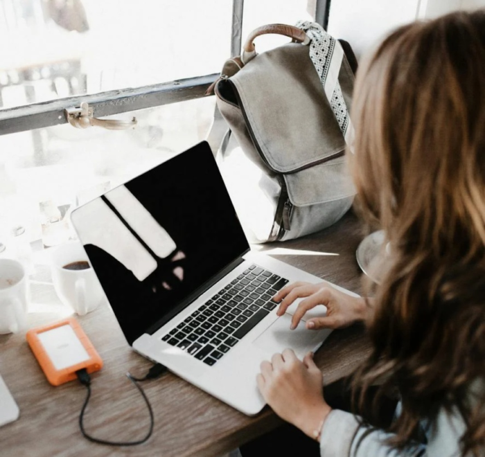 A professional grant writer works at her desk