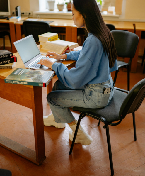 A woman completes a medical coding certificate online