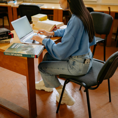 A woman completes a medical coding certificate online