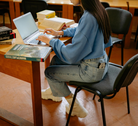 A woman completes a medical coding certificate online