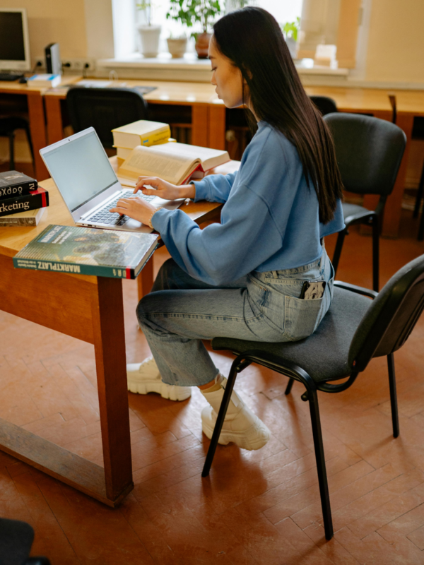 A woman completes a medical coding certificate online