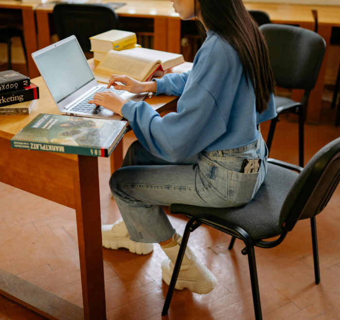 A woman completes a medical coding certificate online