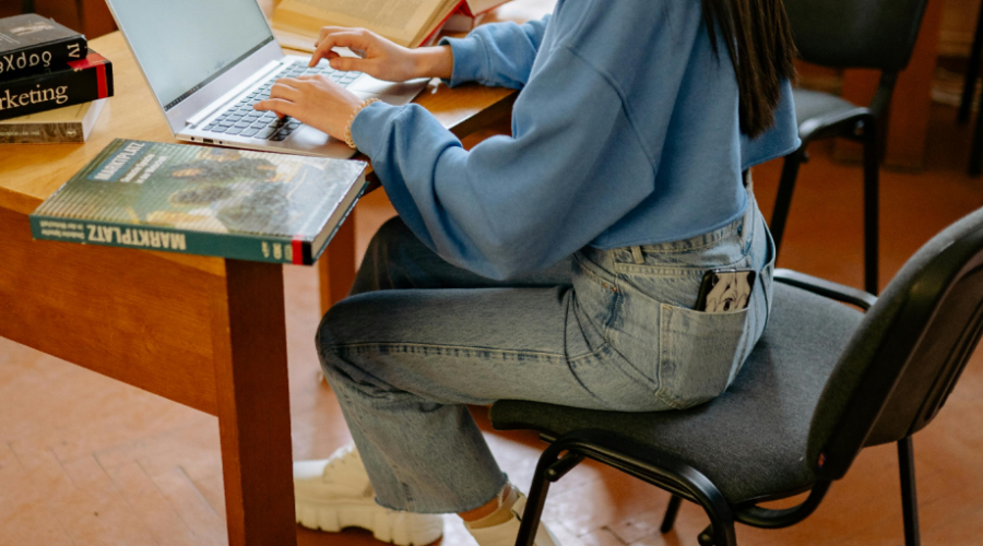 A woman completes a medical coding certificate online