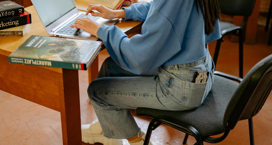 A woman completes a medical coding certificate online