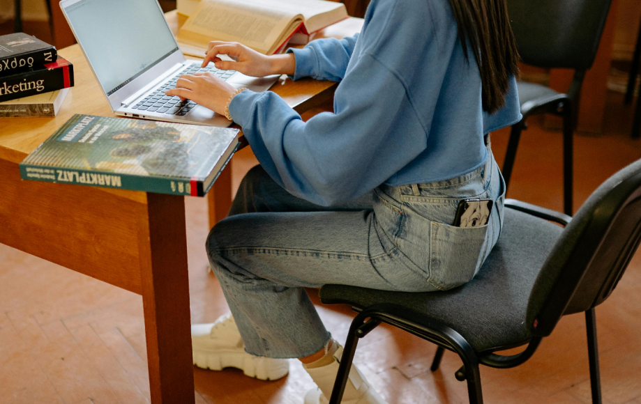 A woman completes a medical coding certificate online