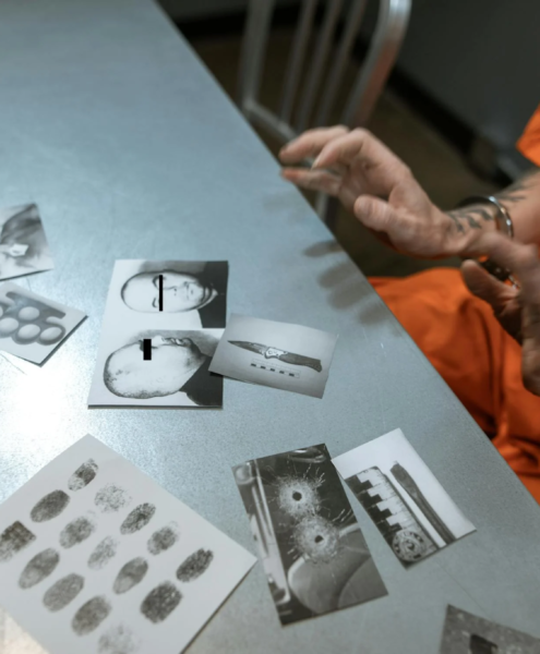 A prisoner reviews evidence in jail