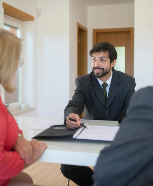 An eager, young entrepreneur meets with his clients