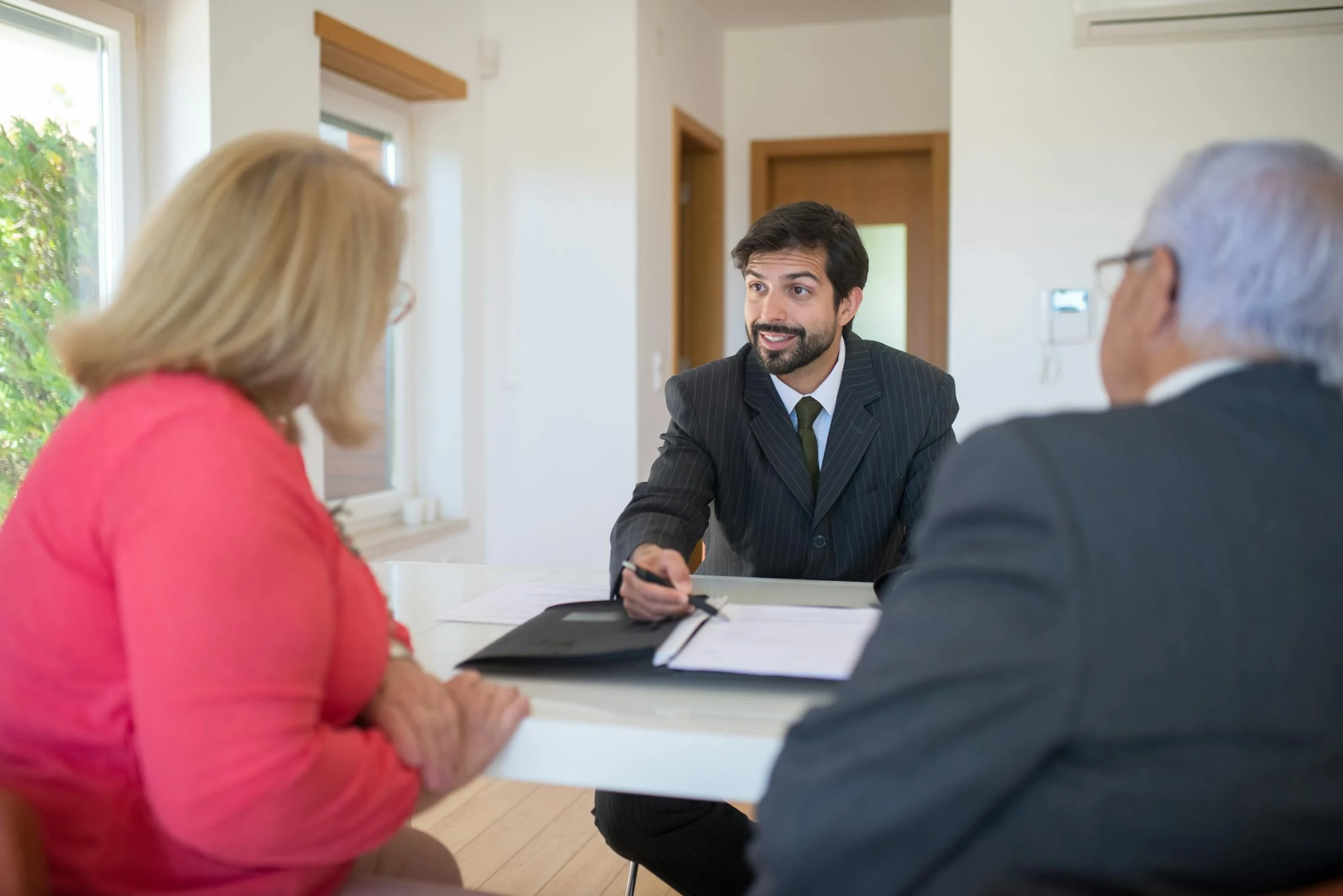 An eager, young entrepreneur meets with his clients