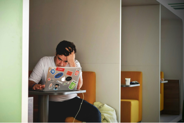 a man sitting in a café and studying