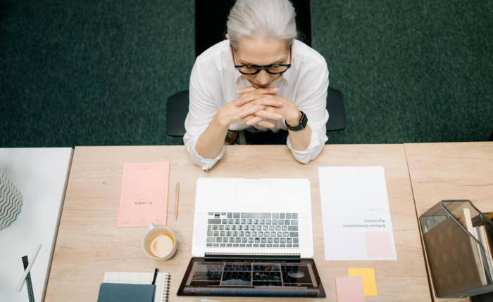 A healthcare administrator works in an office