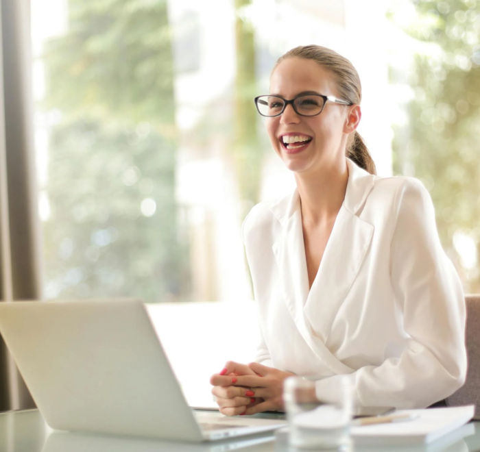 A manager smiles in her leadership role